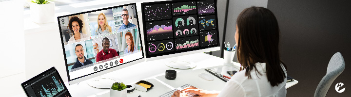 woman using real-time communication for a conference call and also viewing data dashboards