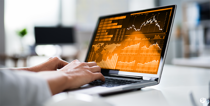 A laptop showing video a analytics dashboard with geographic information, quality of service graphs, and other streaming metrics.