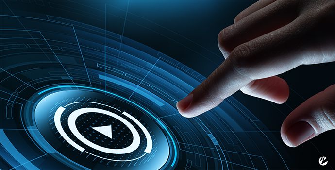 A hand pressing a touch screen with a play video icon to watch a live stream.