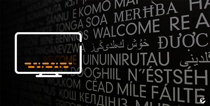 An icon of a monitor with closed captioning and a background image with multilingual translations of the word welcome.