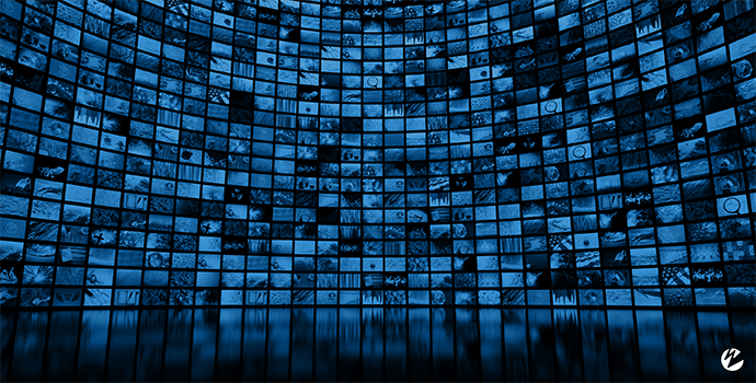 Wall with monitors displayed streaming content.